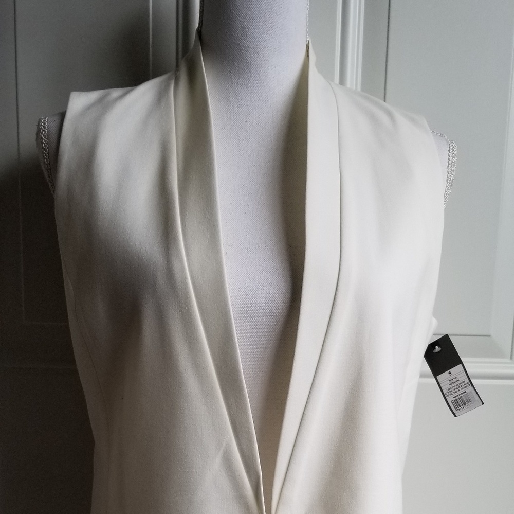 Mossimo sleeveless.Long with no buttons